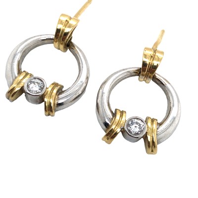 Lot 1067 - A contemporary pair of hoop earrings,...
