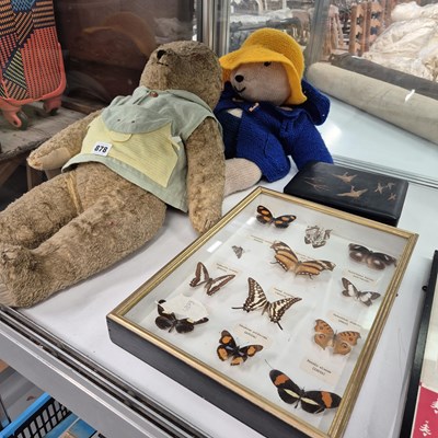 Lot 878 - A teddy bear and a knitted Paddington Bear...