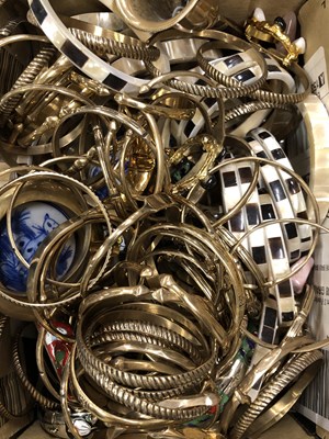 Lot 1075 - A large collection of costume bangles, etc....