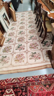 Lot 261 - A needlepoint carpet with floral panels 365 x...