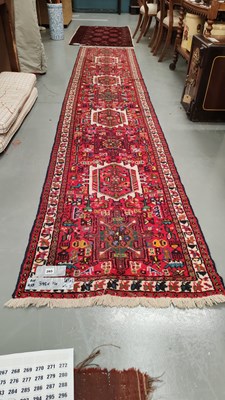 Lot 265 - A Persian Karadja runner 398 x 74cms