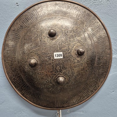 Lot 1309 - An antique Indo-Persian steel shield....