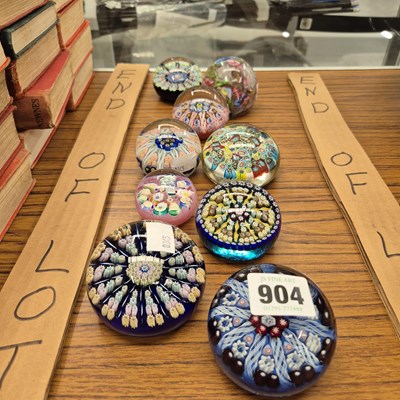Lot 904 - A group of 9 various glass paperweights