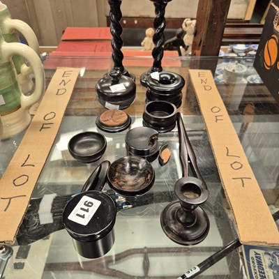 Lot 911 - A collection of ebony treen