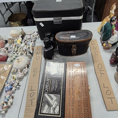 Lot 922 - A cased pair of binoculars and a boxed...