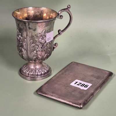 Lot 1286 - A continental silver repousse cup and a...