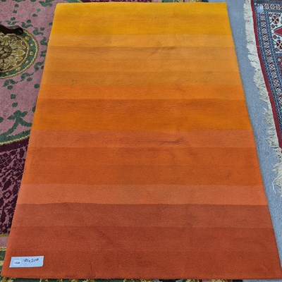 Lot 1328 - A machine made contemporary designer carpet