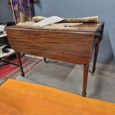 Lot 1321 - An early 19th-century mahogany Pembroke table