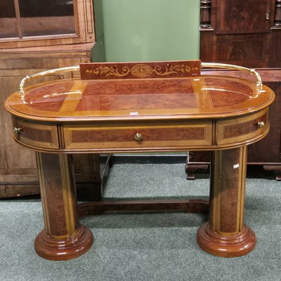 Lot 959 - An Art Deco style mahogany writing desk /table...