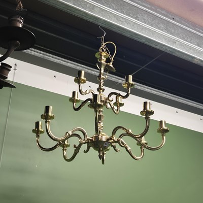 Lot 957 - A twelve arm chandelier