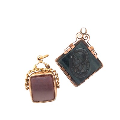 Lot 1143 - Two Vintage locket fob seal pendants, the...