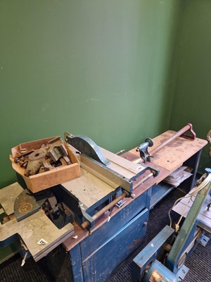Lot 302 - A vintage metal Coronet woodworking bench with...