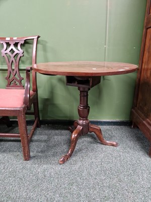 Lot 307 - An early 19th century mahogany tilt top tripod...