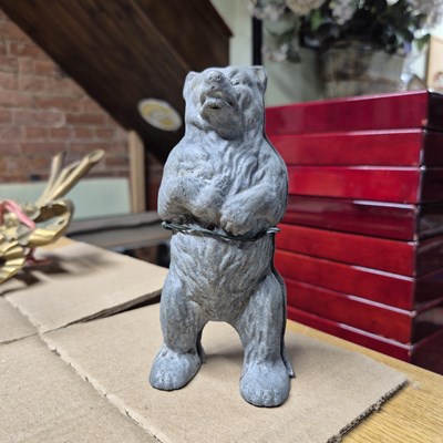 Lot 840a - A Cast alloy bear form money box