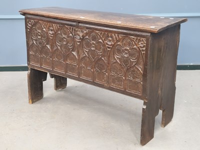 Lot 1370 - An early 18th century oak coffer, the front...