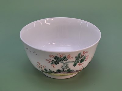 Lot 1379 - An 18th century English tea bowl, possibly...