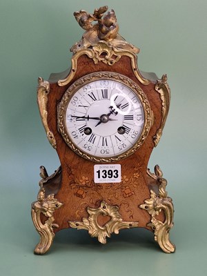 Lot 1393 - An ormolu mounted marquetried rosewood mantle...
