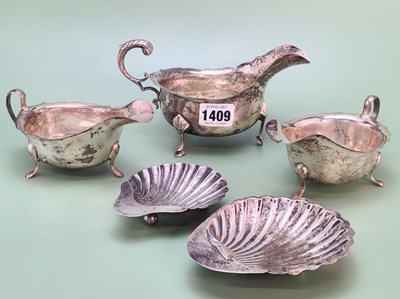 Lot 1409 - A pair of silver sauce boats by Viners,...