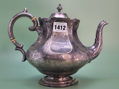 Lot 1412 - A silver tea pot by John Smyth, Dublin 1867,...