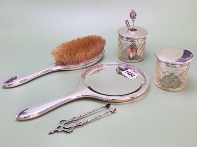 Lot 1420 - A silver backed hair brush, a hand mirror, two...