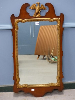 Lot 1425 - A 20th century mahogany cut work framed mirror...