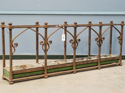 Lot 1426 - A Victorian wrought iron stick stand of four...