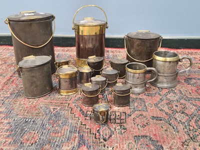 Lot 1428 - Fourteen brass mounted steel creamery...