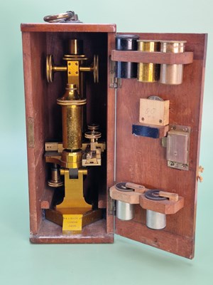 Lot 1435 - A mahogany cased R & J Beck brass monocular...