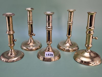 Lot 1438 - A pair of 19th century brass candlesticks with...