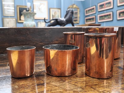 Lot 1442 - Six various copper cylindrical moulds, the two...