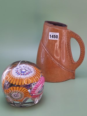 Lot 1450 - A Doulton stoneware 'leather' jack. H 19cm,...
