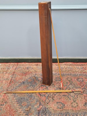 Lot 1457 - A mahogany hinged lidded case/quiver of eleven...