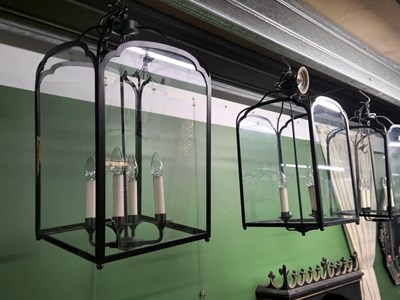 Lot 5 - Five wrought iron style painted metal chandeliers