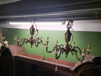 Lot 8 - A pair of brass chandeliers