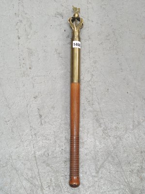 Lot 1468 - A wooden handled brass tipstaff, the open work...