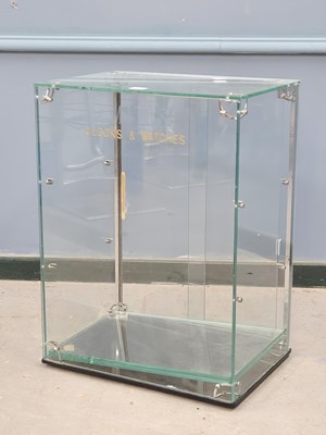 Lot 1504 - A glass table top cabinet inscribed Smith's...