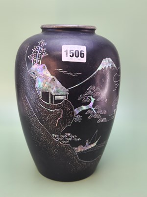 Lot 1506 - A Japanese black lacquer ovoid vase inlaid...