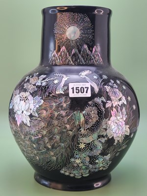 Lot 1507 - A Japanese black lacquer vase, a mother of...