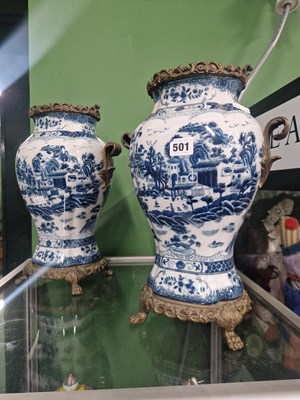 Lot 501 - A pair of ormolu mounted blue and white...