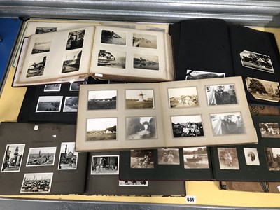 Lot 531 - Four family photograph albums together with...