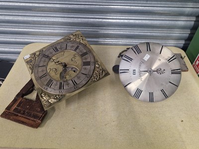 Lot 533 - A circular and a square long case clock face...