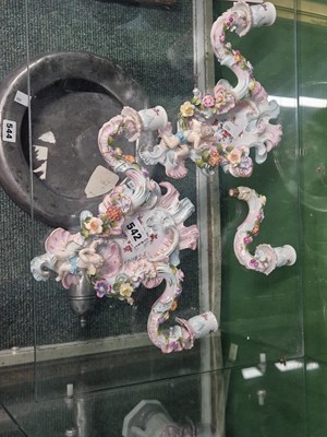 Lot 542 - A pair of Dresden porcelain two branch wall...