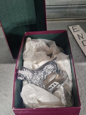 Lot 571 - A chrome plated spaniel car mascot by Lejeune