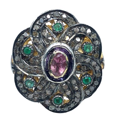 Lot 1016 - A large dress ring set with pink tourmaline,...
