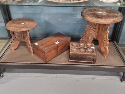 Lot 587 - Two Islamic miniature tables, a mahogany box...