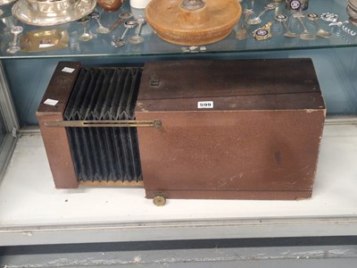 Lot 599 - A boxed photographic instrument with bellows...