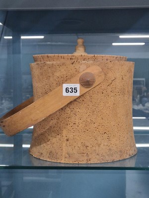 Lot 635 - A metal lined cork ice bucket