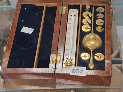 Lot 652 - A mahogany cased Sike's hydrometer