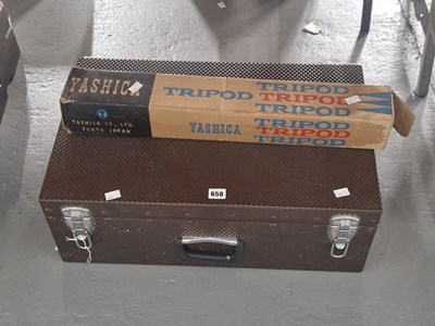 Lot 658 - A metal suitcase fitted to take cameras and...