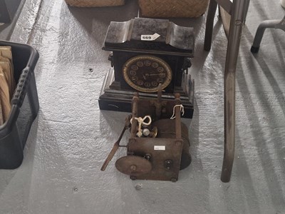 Lot 669 - A black slated cased mantle clock together...